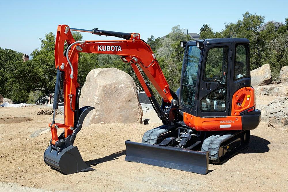 Compact excavator on a site